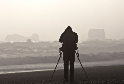 Photographer on a beach